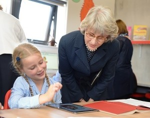 HRH The Duchess of Gloucester chats to a Junior School pupil