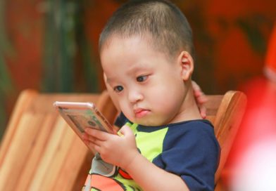 Child with smart phone