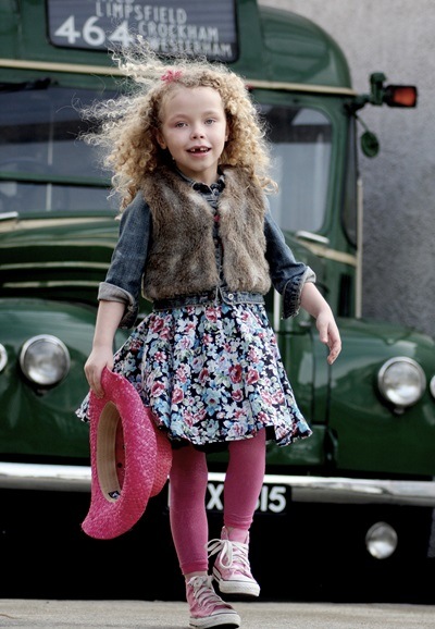 Girl is walking along the street