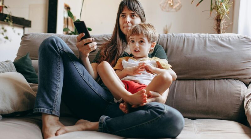 Mother and child watching TV