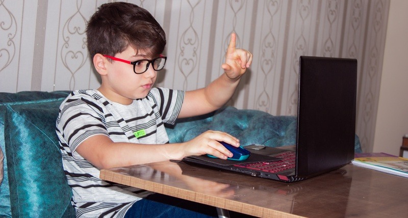 A boy with computer