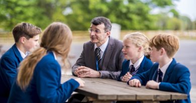 King's School, Macclesfield. Head of the school with children