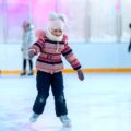 Young girl skating at the ice rink | photo by Anton Belitskiy, pexels