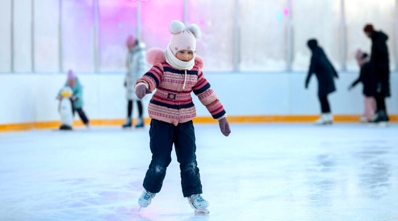 Young girl skating at the ice rink | photo by Anton Belitskiy, pexels